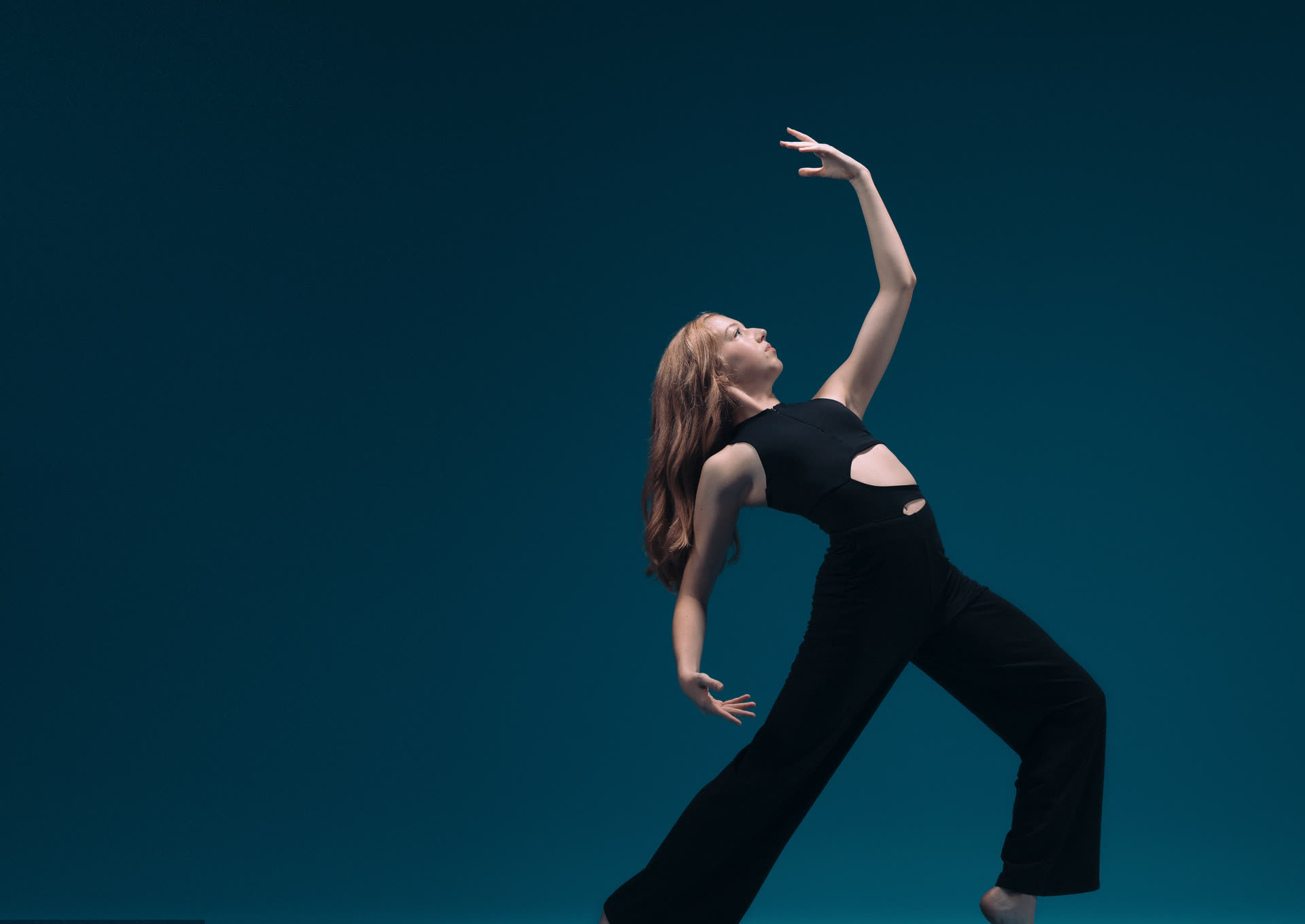 Contemporary dancer in an expressive reach