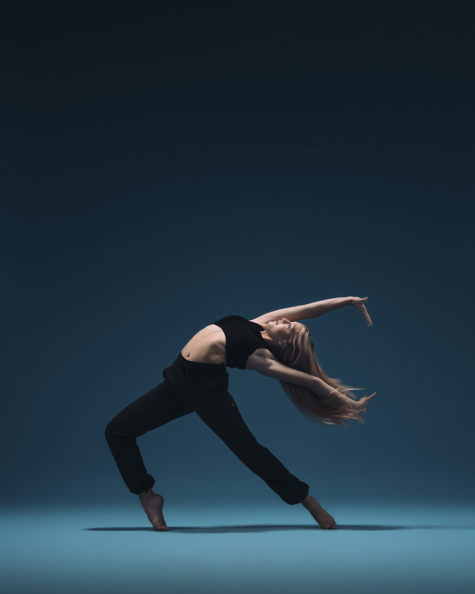Dancer in a deep contemporary lunge