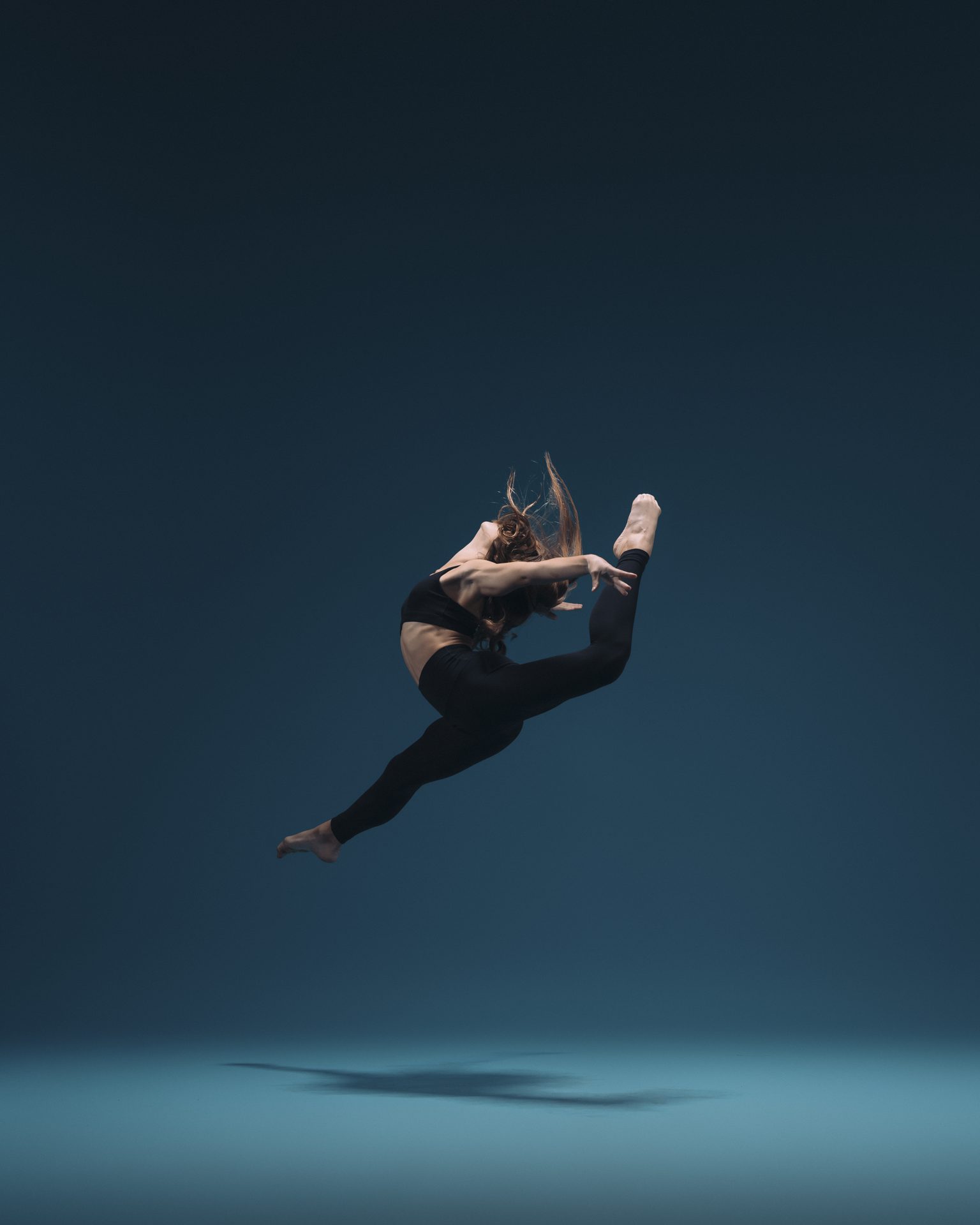 Dancer in a ring leap
