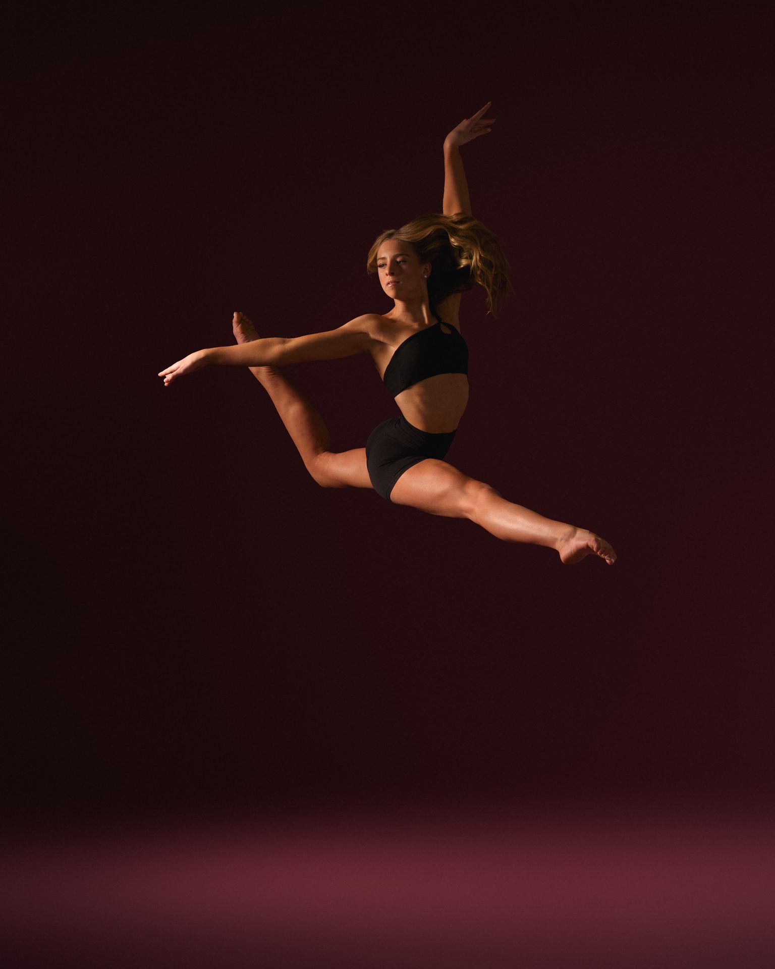 Dancer in a powerful split leap