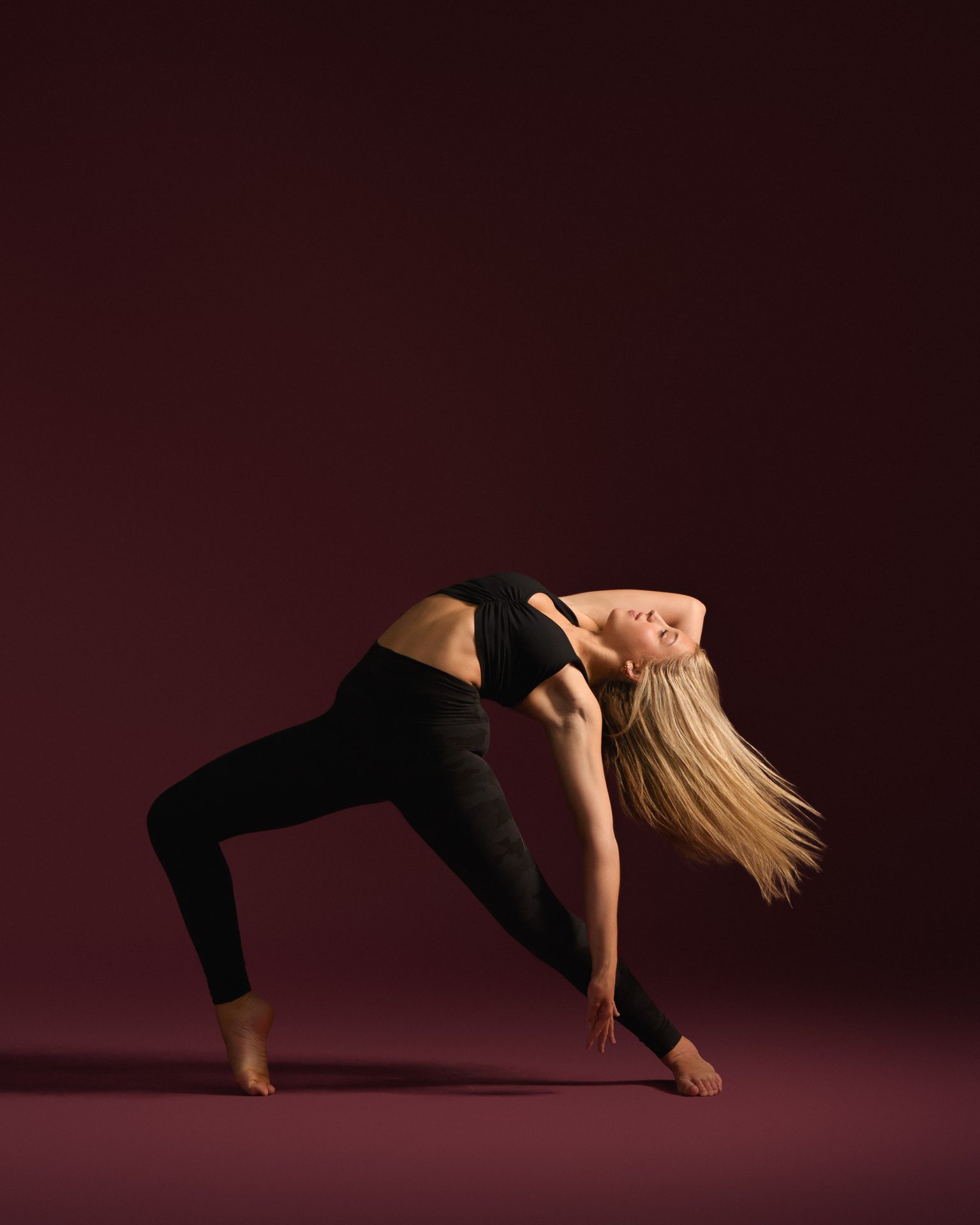 Dancer in a deep standing backbend